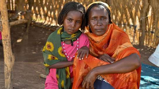 Woman and child embracing