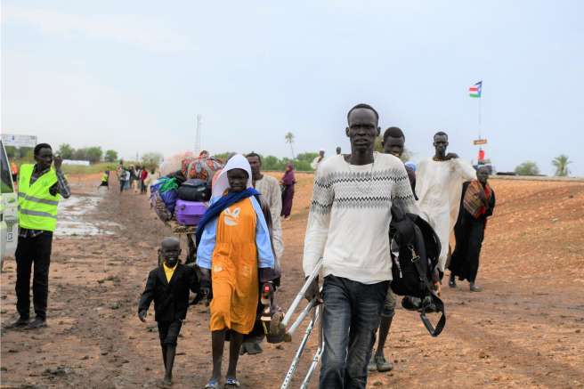 New arrivals pictured  just after crossing from Sudan into South Sudan