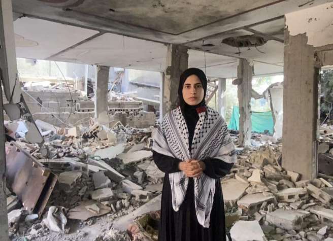 Girl standing in rubble 