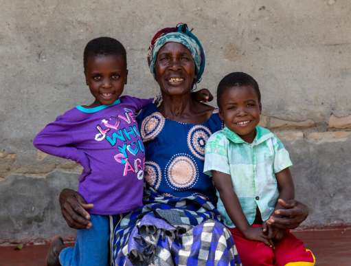 Janet Zirugo (centre) poses with her granddaughter Taonga, 5 (left) and Mufaro 4 (right) at their homestead in Njani village, Ward 8 of Mutoko District, Mashonaland East Province of Zimbabwe.