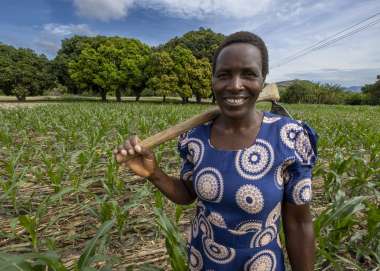 Nyarai Zirugo in her crop field in Zimbabwe